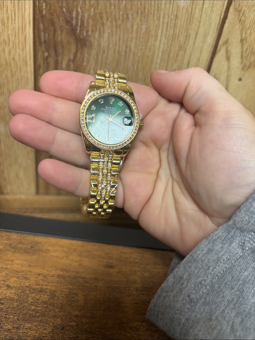 Rolex Gold Watch with Green Dial and Crystal Accents